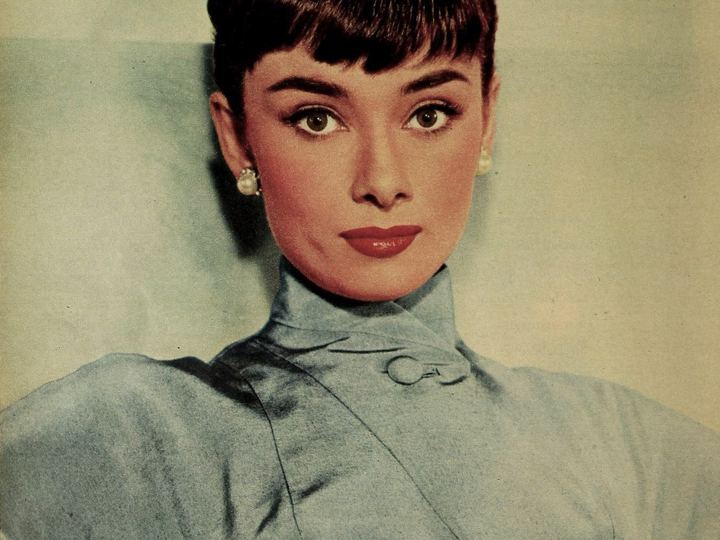 Black and white studio portrait of Audrey Hepburn in 1953