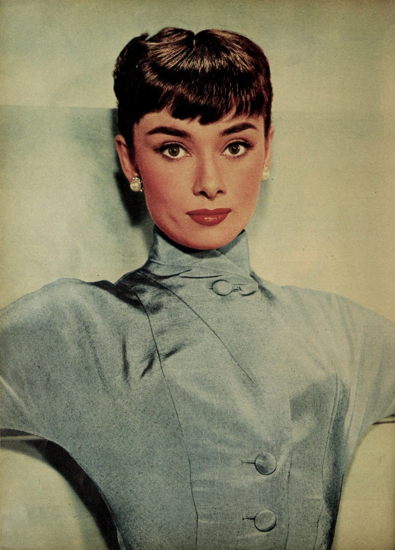Black and white studio portrait of Audrey Hepburn in 1953