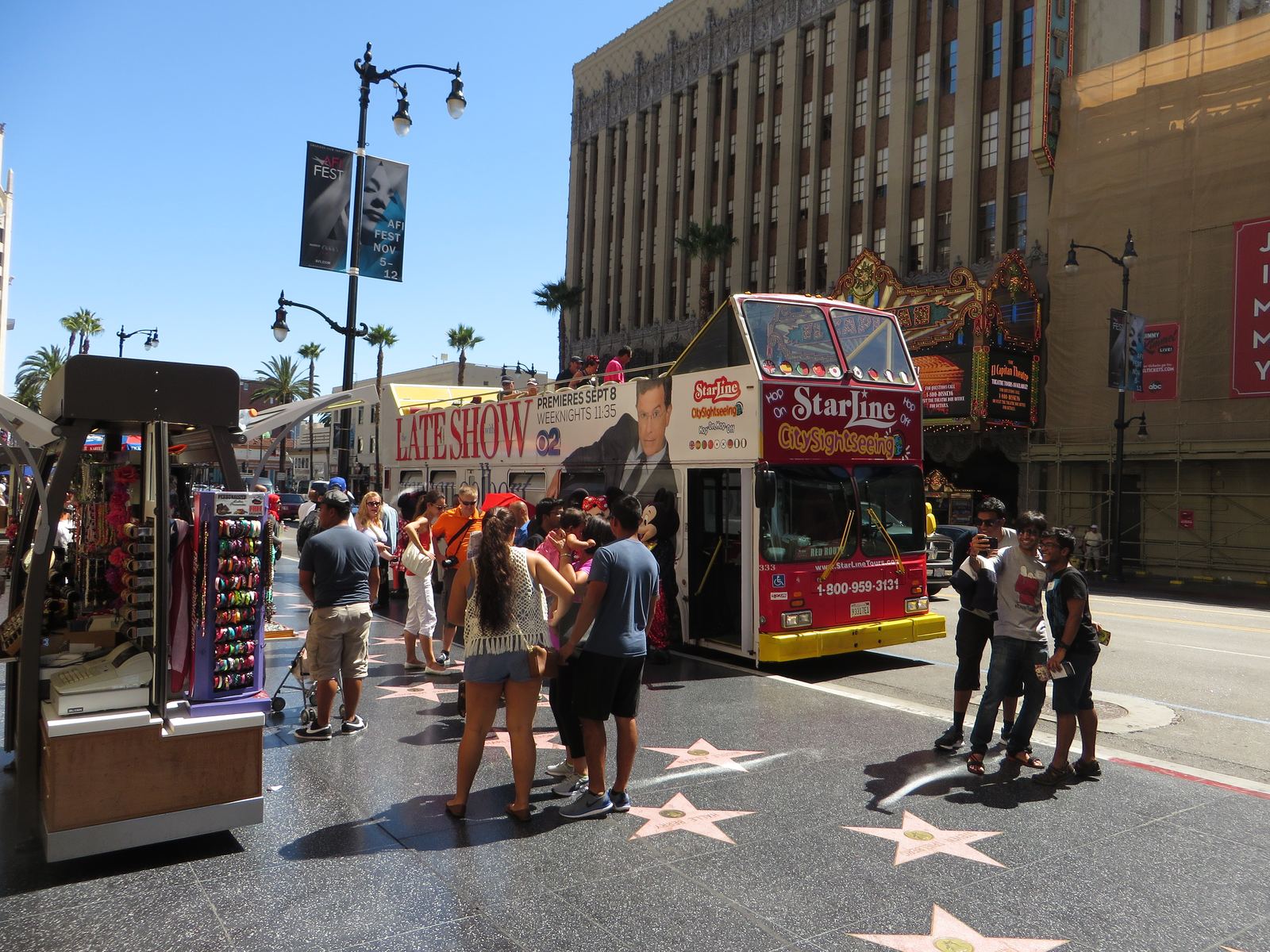 Coral and charcoal stars set into the sidewalk on Hollywood Boulevard