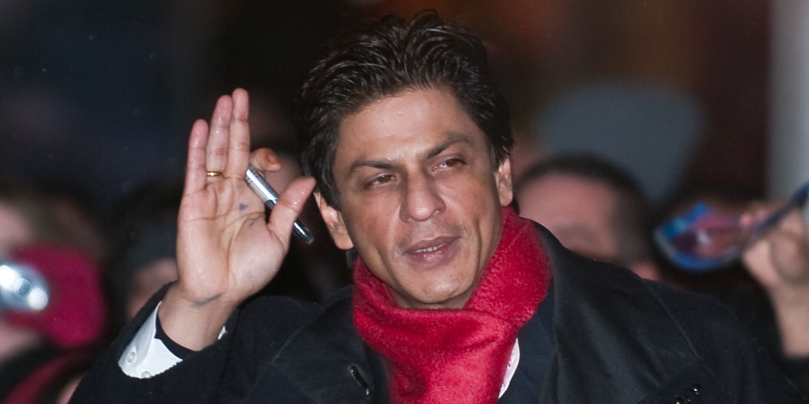 Shah Rukh Khan waving to fans at the Berlin International Film Festival in 2010